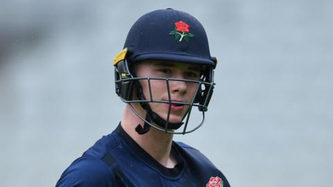 Rocky Flintoff leaves the field after scoring 88 for Lancashire