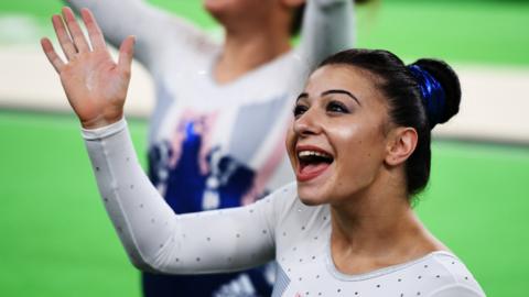 Claudia Fragapane smiling and waving