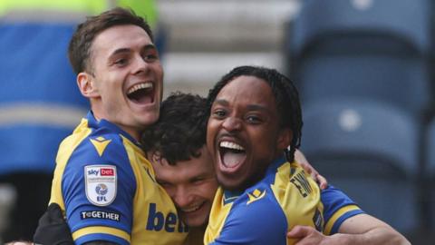 Luke McNally of Stoke City scores to make it 1-2 and celebrates