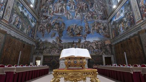 A view from the Sistine Chapel, specially arranged ahead of the Papal Conclave to elect the new pope as voting desks for the 133 cardinals have been placed beneath Michelangelo's frescoes.