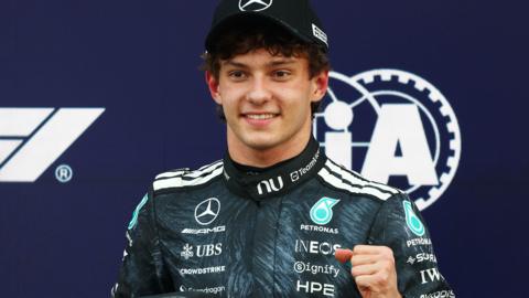 Mercedes' Kimi Antonelli gives the thumbs-up signal after taking pole position for the Japanese Grand Prix