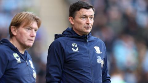 Paul Heckingbottom and number two Stuart McCall look concerned during PNE's 2-1 defeat at the CBS Arena