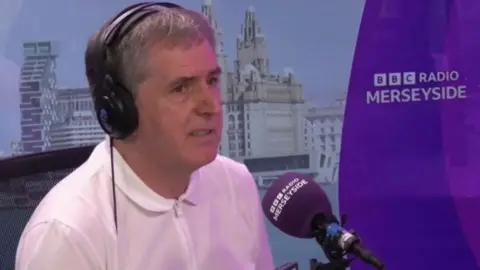 Steve Rotheram in a BBC Radio Merseyside studio