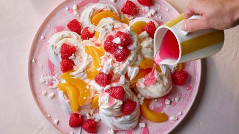 Easy raspberry, peach and rose pavlova