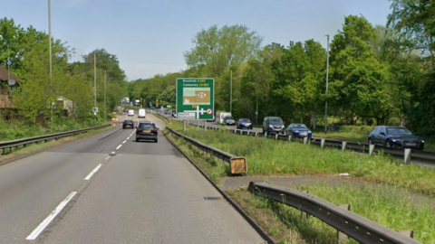 A Google Street image of an A-road with a central reservation.