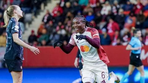 Melchie Dumornay celebrates her goal v Bayern Munich