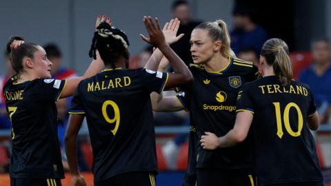 Fridolina Rolfo is congratulated by her teammates after scoring her first Manchester United goal