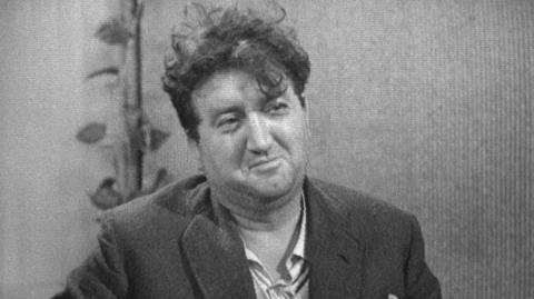 Brendan Behan in the studio during the interview.