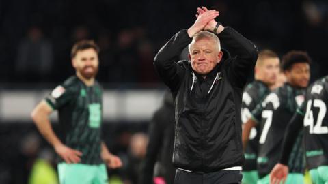 Sheffield United boss Chris Wilder claps the win at Derby County