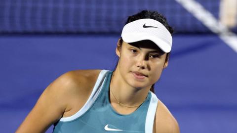 Emma Raducanu looks forlorn during her Dubai Tennis Championships match