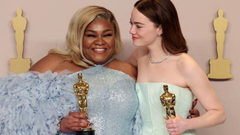 Emma Stone and Da'Vine Joy Randolph hold their Oscars for Best Actress Oscar for Poor Things and Best Supporting Actress Oscar for The Holdovers respectively, in the Oscars photo room at the 96th Academy Awards in Hollywood, Los Angeles, California, US, on 10 March 2024