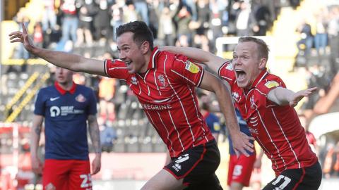 Tom Hopper celebrates his goal