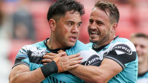 Andre Savelio plundered a hat-trick for a dominant Hull FC