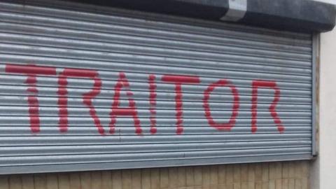 Graffiti reading 'Traitor'