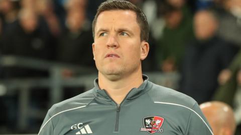 An unhappy Gary Caldwell watches Exeter City