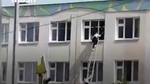 Student escaping from a window