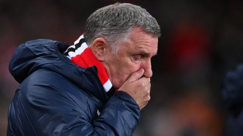 Tony Mowbray holds his nose in frustration after another chance is missed