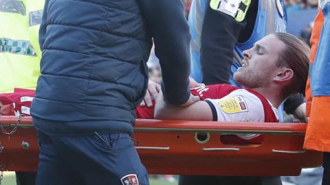 Kyle Taylor stretchered off