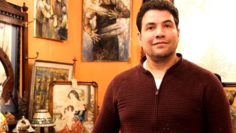 Mohsen Souli in his antiques shop in Finnieston