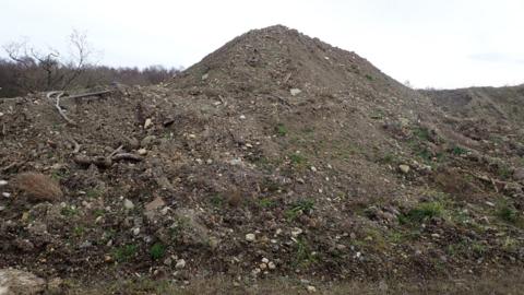 Pile of contaminated soil used by Bellway at Stannington site