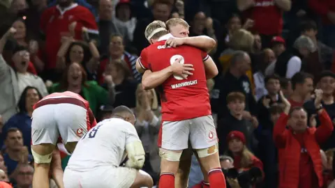 Aaron Wainwright hugs Jac Morgan