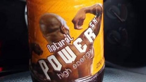 A close shot of the soft drink. It has a prominent label which reads bottle shows the word "power" prominently