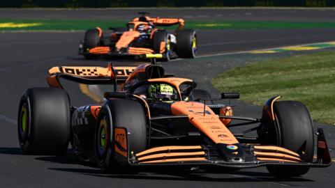 Lando Norris and Oscar Piastri on track during the Australian Grand Prix
