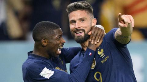 Olivier Giroud (right) celebrates scoring for France against Australia at the World Cup