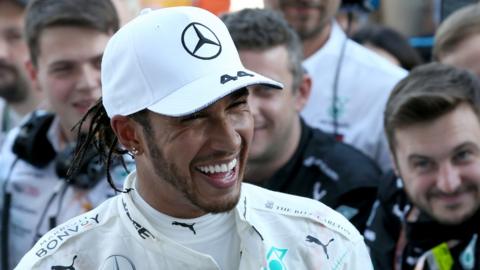 Lewis Hamilton smiling after winning the 2019 Russian Grand Prix