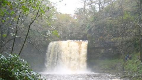 Sgwd yr Eira waterfall in full flow