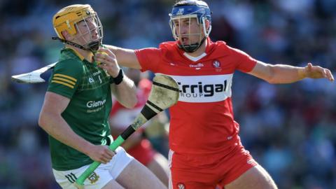 Derry's Meehaul McGrath battles with Meath's Niall McLarnon at Croke Park