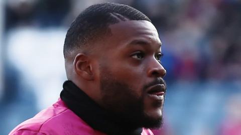 Olivier Ntcham warms up before a Swansea game last season