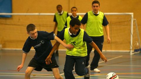 Boys playing football