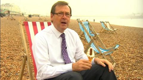 John Hess on a deck chair
