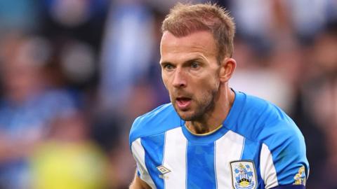 Jordan Rhodes looks to make a run for Huddersfield