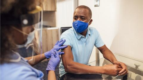 Man receiving vaccine