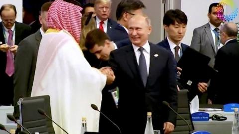 Putin and Saudi crown prince high five