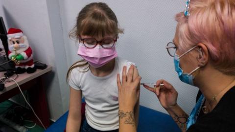 Child getting vaccine