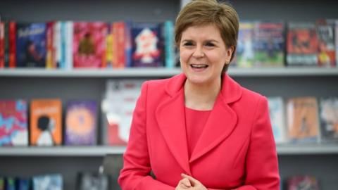 Nicola Sturgeon in a library