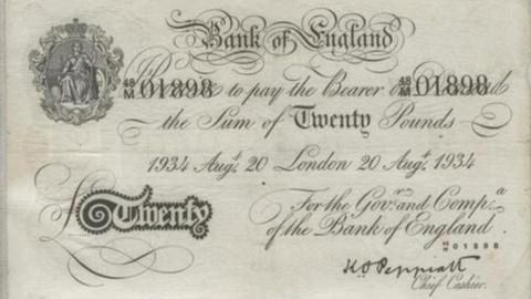 A counterfeit British banknote