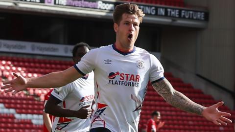 Luton's James Collins celebrates