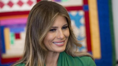 Melania Trump smiles on a visit to a school in April 2017