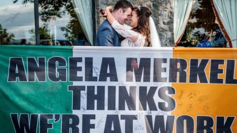 Richie and Orlagh on their wedding day with the flag