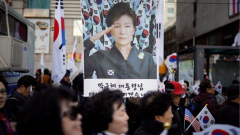Supporters of South Korean President Park Geun-hye attend a protest near the constitutional court in Seoul, 9 March 2017