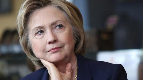 Hillary Clinton listens during a campaign stop in Virginia.