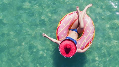 Person on a rubber ring in the sea