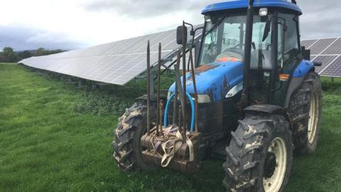 Tractor and solar panels at the Rhug estate