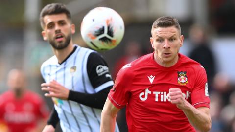 Wrexham striker Paul Mullin in action against Notts County in April 2023