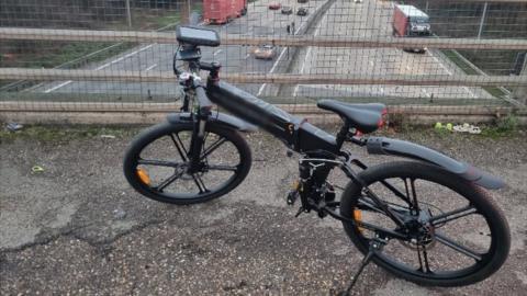 An e-bike on a bridge