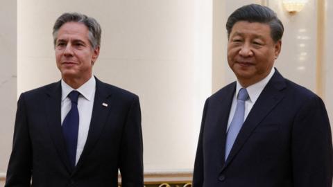 China's President Xi Jinping (R) receives US Secretary of State Antony Blinken prior to their meeting at the Great Hall of the People in Beijing on June 19, 2023.